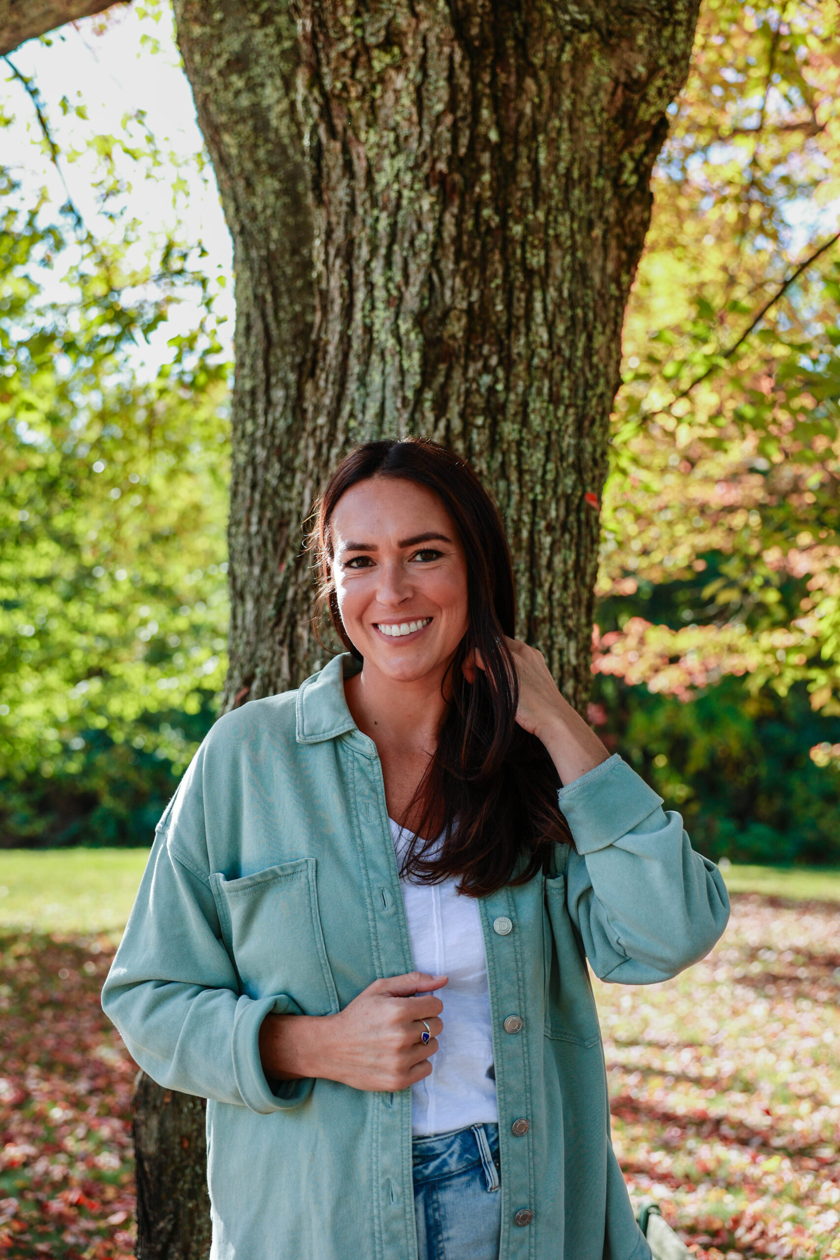 Founder stepping away from business while walking her property, reflecting on vision and legacy.